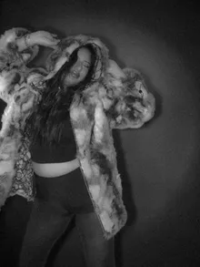 Black and white portrait in a fur coat
