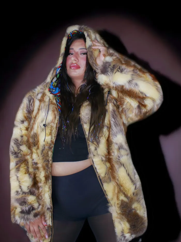 Portrait in a fur coat under violet light